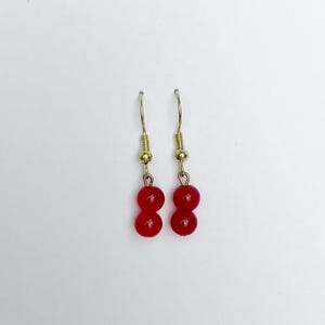 two bead dangle earrings