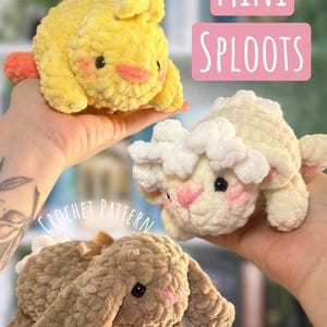 May include: Three crocheted plush toys: a yellow duck, a white sheep, and a brown bunny. The toys are labeled "Mini Sploots" and "Crochet Pattern". The duck has orange feet and a pink beak. The sheep has pink cheeks. The bunny has long ears and a bow.