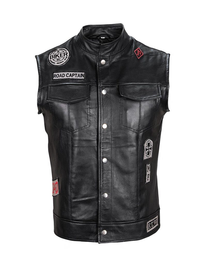 May include: Black leather motorcycle vest with multiple patches, including "Biker MC", "Road Captain", and "MF".