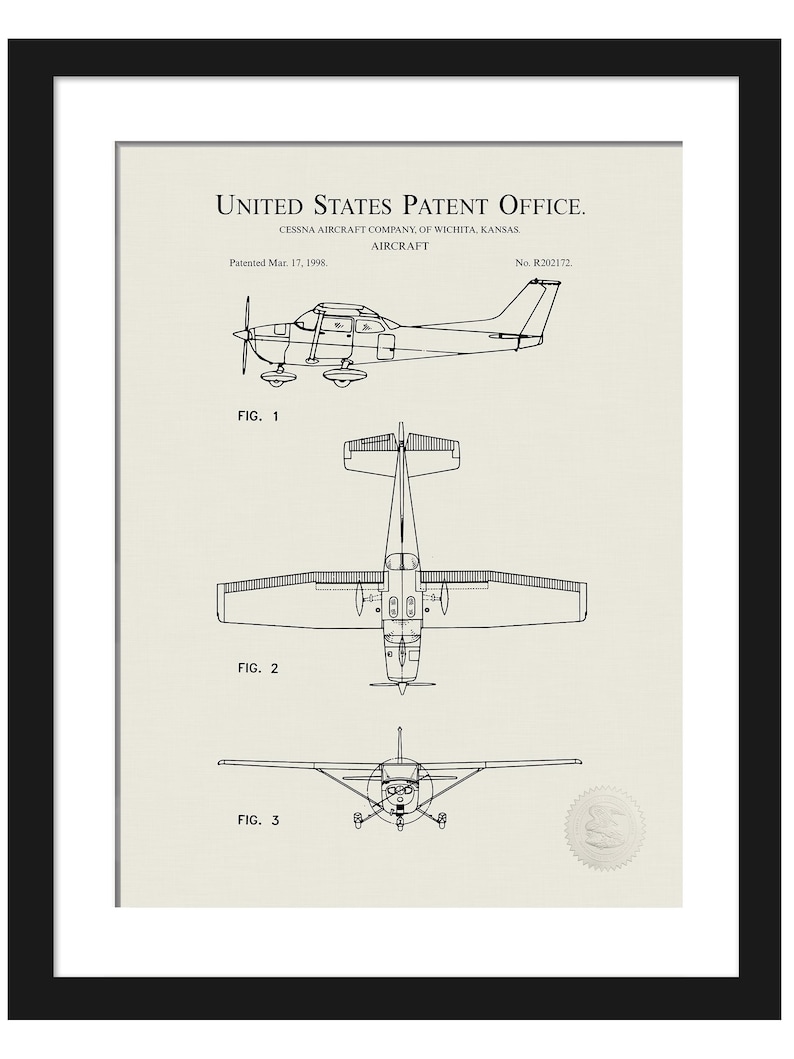 May include: Black framed print of a Cessna aircraft patent. The print shows three views of the aircraft: side, top, and front. Text includes "United States Patent Office" and "Cessna Aircraft Company, of Wichita, Kansas."