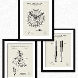 May include: Three black framed prints of vintage patent drawings. The top print shows a map of the world with the text "United States Patent Office". The middle print shows a sextant with the text "United States Patent Office". The bottom print shows a telescope with the text "United States Patent Office".