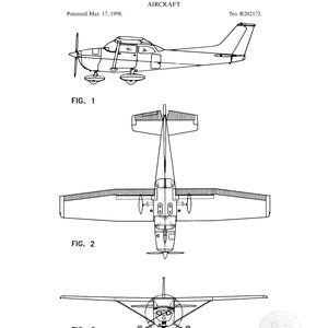 May include: Black and white patent illustration of an aircraft, with three views: side, top, and front. The text reads "United States Patent Office" and "Cessna Aircraft Company, of Wichita, Kansas." The patent date is March 17, 1998.