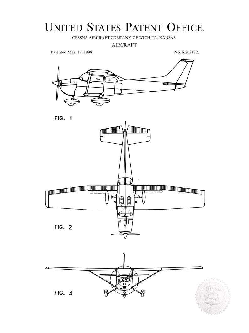 May include: Black and white patent illustration of an aircraft, with three views: side, top, and front. The text reads "United States Patent Office" and "Cessna Aircraft Company, of Wichita, Kansas." The patent date is March 17, 1998.