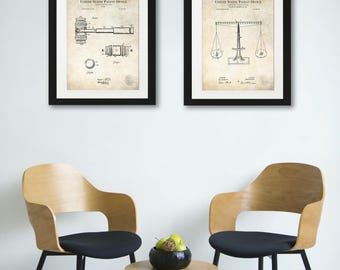 May include: Two framed black and white patent drawings. The left drawing shows a gavel, and the right drawing shows a scale. Both drawings have a vintage look and are framed in black.