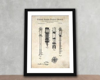 May include: Framed vintage patent print of a voltage tester. The print, in sepia tones, features detailed technical drawings and the text "United States Patent Office." The black frame complements the artwork, suitable for a home or office.
