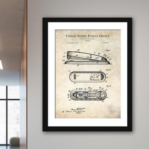 May include: A vintage black and white patent drawing for a stapler. The drawing shows the stapler in detail, with labels for each part. The patent number is 2,300,312 and the date is May 7, 1942. The text "UNITED STATES PATENT OFFICE" is at the top of the drawing.