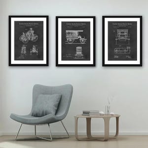 May include: Three black framed prints of vintage car patent drawings on a white wall. The drawings are in black and white and feature the text "United States Patent Office".