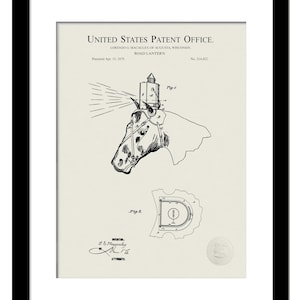 May include: Black and white line drawing of a patent for a road lantern. The patent is for a lantern that is attached to the head of a horse. The patent drawing shows the lantern on the horse's head and a side view of the lantern. The patent is titled "Road Lantern" and was patented on April 15, 1879. The patent number is 214,422.
