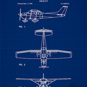 May include: Blueprint-style illustration of an aircraft patent from the United States Patent Office. The image features three views of the aircraft: side, top, and front. The text includes "Cessna Aircraft Company, of Wichita, Kansas" and "Patented Mar. 17, 1998."