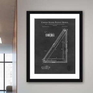 May include: Black and white patent drawing of a triangle ruler. The drawing is titled "United States Patent Office." The patent number is 1,418,212. The patent was issued June 6, 1922, to Edwin A. Dembowski of Wilkes-Barre, Pennsylvania.