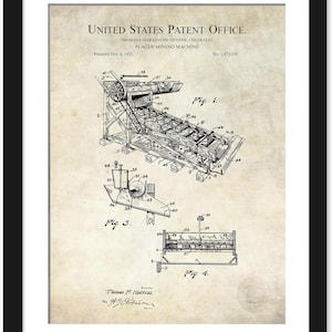 May include: A framed patent print from the United States Patent Office, featuring a detailed technical drawing of a placer mining machine. The drawing is in black and white, with multiple views and labels. The patent was granted to Thomas E. Harkins of Denver, Colorado.