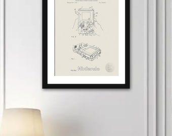 May include: Black and white patent drawing of a handheld video game system. The drawing shows the system from the front and side views. The text "United States Patent Office" and "Nintendo" are visible.