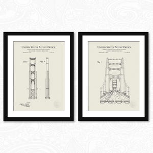 May include: Two black framed prints of a patent drawing for a suspension bridge. The drawing is in black and white and shows the bridge from different angles. The text "UNITED STATES PATENT OFFICE" is at the top of each print.