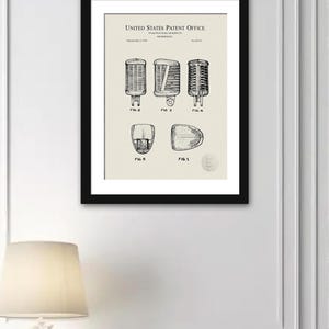 May include: Black and white patent drawing of a microphone design. The drawing shows different views of the microphone, labeled with numbers. The text "United States Patent Office" is at the top of the drawing.