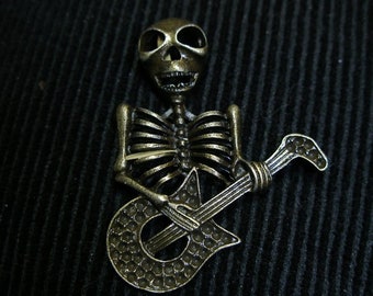 Skulls, gas masks, skeleton charms pendants, (4)  GeekyFreakyUnique-y TeamESST OlympiaEtsy Halloween24/7 SpookyCute, SupportingArtists, WWWG