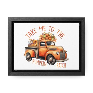 May include: A vintage orange truck with a bed full of pumpkins, apples, and autumn foliage. The truck has the text "Take Me To The Pumpkin Patch" written around it.