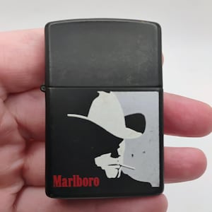 Vintage Marlboro Man Zippo Lighter - Black Matte Cowboy Silhouette - Great Condition With Minimal Wear - Does Spark But Otherwise Untested