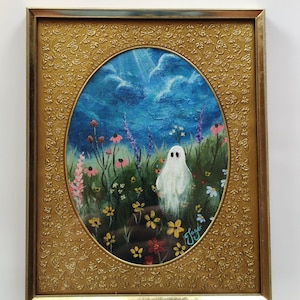 May include: A framed painting of a white ghost standing in a field of colorful flowers. The background is a blue sky with white clouds.