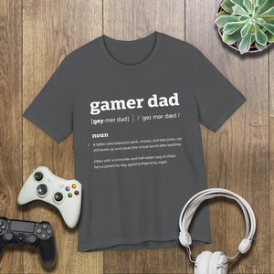 This is a Bella+Canvas 3001 Unisex Jersey Tee with the “Gamer Dad Dictionary Definition Shirt with Funny Quote for Fathers Who Play Video Games” design on the front of the shirt. Image 4