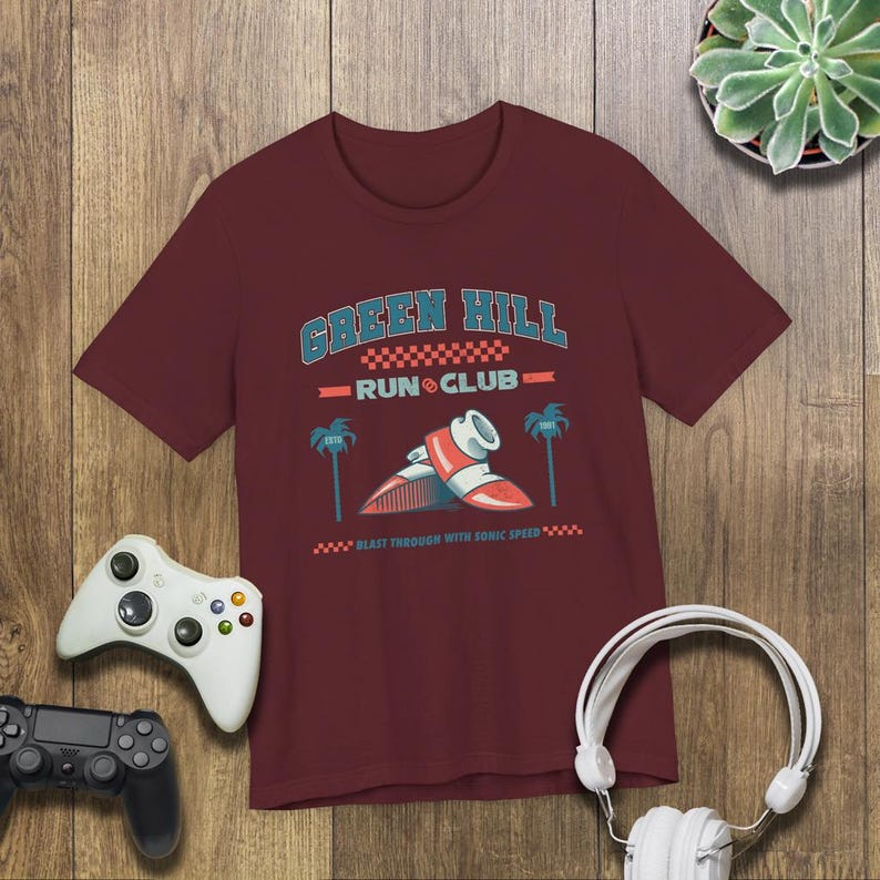 This is a Bella+Canvas 3001 Unisex Jersey Tee with the “Green Hill Run Club Funny Gamer Shirt for 90s Retro Video Game Fans” design on the front of the shirt. Image 4