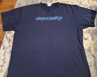 Camiseta Nike gris vintage de los años 90 con gráfico "Just Do It", talla XL