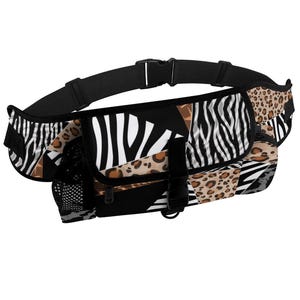 May include: A waist bag featuring a patchwork design of black, white, and brown animal prints including zebra stripes and leopard spots. The bag has a black adjustable strap with a plastic buckle, a front flap with a buckle closure, and a side mesh pocket.