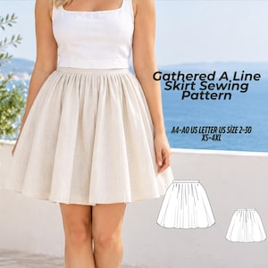 Può includere: Un cartamodello per gonna a trapezio arricciata color beige con il testo Gathered A-Line Skirt Sewing Pattern, A4-A0 US Letter US Size 2-30 XS-4XL, e due disegni al tratto in bianco e nero del modello di gonna sulla destra.