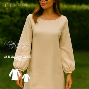 Könnte beinhalten: Ein beiges Minikleid mit langen, voluminösen Ärmeln. Das Kleid hat einen U-Boot-Ausschnitt und ein schlichtes, elegantes Design. Der Text "Victoria Pattern" und "Mini Dress Pattern" sind sichtbar. Größen XS-4XL.