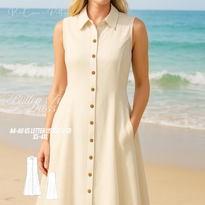 Puede incluir: Vestido sin mangas con botones delanteros, de color beige claro. El vestido presenta un cuello camisero, botones de madera y dos bolsillos delanteros. El vestido se muestra en una persona en una playa. El texto "Button Front Dress" es visible.