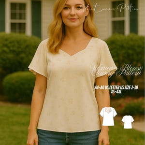 May include: A woman wearing a cream-colored blouse with a V-neck and short sleeves. The blouse has a floral pattern. Text on the image reads "Women's Blouse Sewing Pattern" and size information. The blouse is part of a sewing pattern.