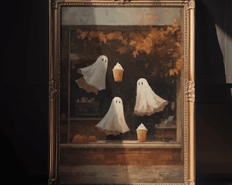 May include: A framed painting featuring a whimsical Halloween scene. The artwork depicts white ghost figures and iced coffee cups against a backdrop of autumn foliage. The frame is gold, and the overall aesthetic is vintage.