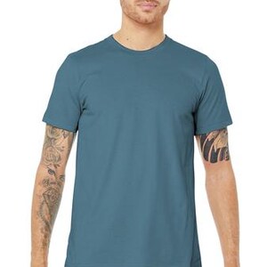 May include: A plain, light blue t-shirt with short sleeves. The t-shirt is made of a soft, comfortable fabric.