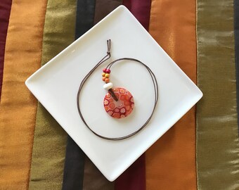 Orange and Red Glass Donut Necklace