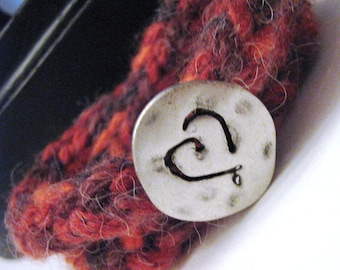 Pulsera de cordón tejido