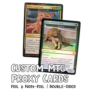 May include: Two custom trading cards featuring orange tabby cats. The top card is titled Mars, Long Fang, and the bottom card is titled Mars, Gremlin Pose. Both cards include game text, mana symbols, and creature type labels on a standard card layout.
