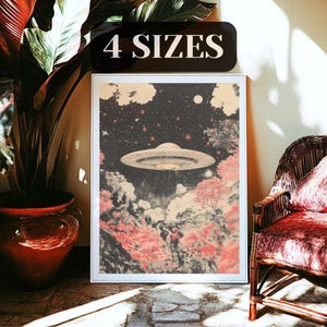 May include: A framed art print featuring a retro-style illustration of a UFO hovering over a landscape with pink trees and a starry night sky. The print is labeled "4 SIZES" in a black rectangle.