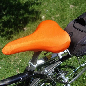 Bicycle Saddle Cover - Bright Orange - fits saddles approx: 10”L  x  7”W  x  2”H