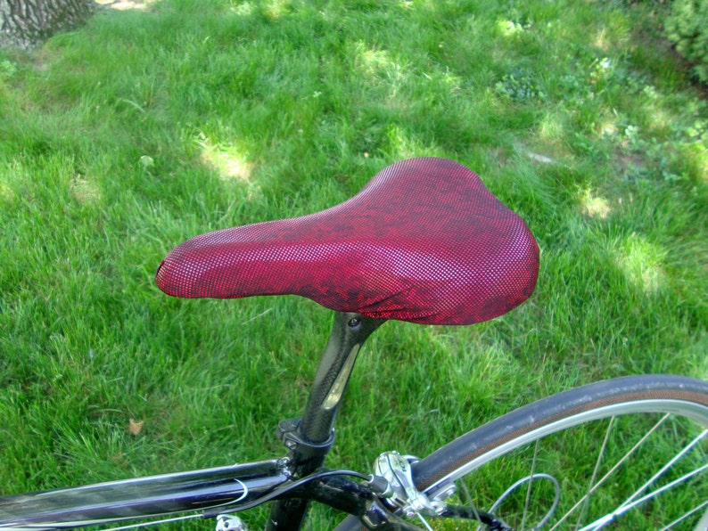 Bicycle Saddle Cover Dark Red Metallic fits saddles approx: 10L x 7W x 2H image 1