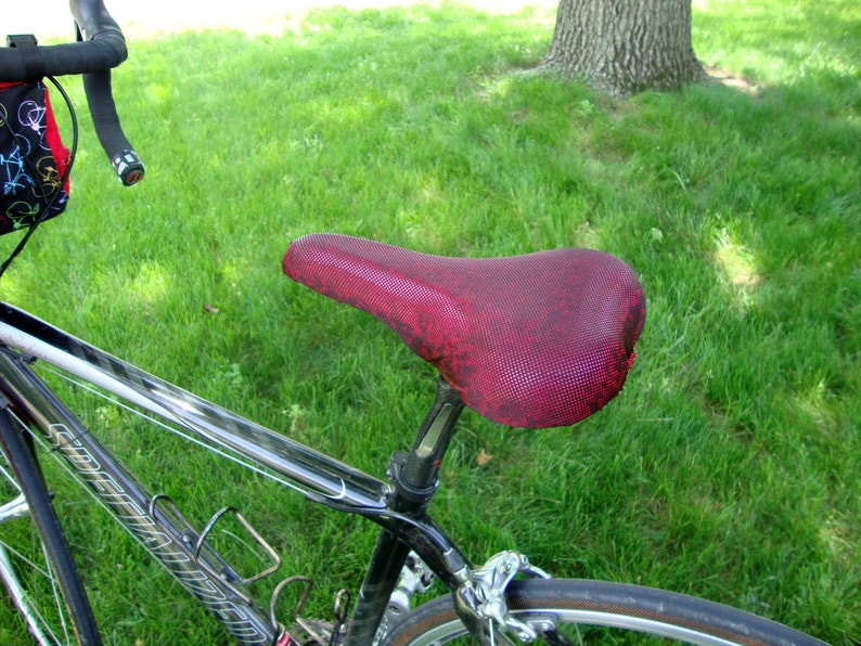 Bicycle Saddle Cover Dark Red Metallic fits saddles approx: 10L x 7W x 2H image 3