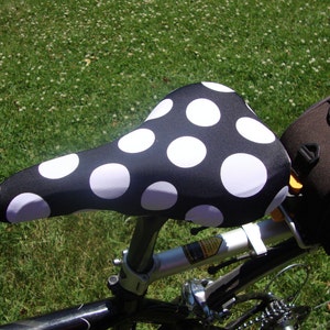 Bicycle Saddle Cover Black with White Polka Dots fits saddles approx: 10L x 7W x 2H image 1