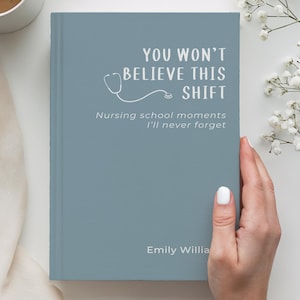 May include: A blue hardback book with white text that reads "YOU WON'T BELIEVE THIS SHIFT" and "Nursing school moments I'll never forget" with a stethoscope graphic. The author name "Emily Willia" is printed in white at the bottom of the cover.