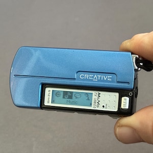 Creative MuVo TX MP3プレーヤー: 512MB ブルーミニプレーヤー - Etsy 日本