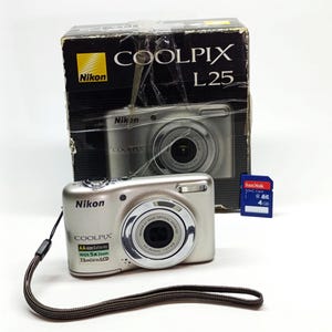 Nikon Coolpix L25: 10.0MP Silver Compact Digital Camera (SD 4 GB