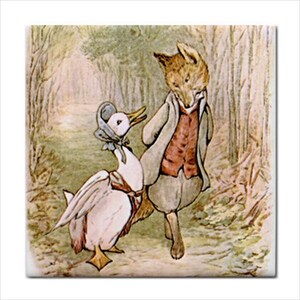 May include: A square decorative tile featuring a watercolor illustration of a white duck wearing a blue bonnet and a red shawl, walking alongside a brown fox dressed in a grey coat and a red vest, set against a soft-toned woodland background.