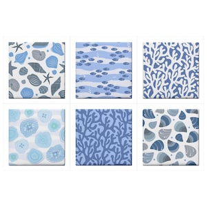 May include: Six square ceramic tiles with ocean-themed patterns. Designs include seashells, starfish, schools of fish, coral, and abstract aquatic shapes in shades of blue and gray on a white background.