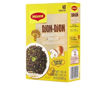 Puede incluir: Una caja amarilla de caldo de champiñones Maggi Dijon-Djon. La caja presenta una imagen de un hongo y un plato de arroz con guisantes. El peso neto es de 480 g.