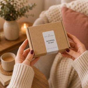 May include: A rectangular brown cardboard gift box featuring a white vertical label centered on the lid. The label displays the text GIFT DELIVERY, Something for you!, and the website address www.giftdelivery.co.uk in black sans-serif font.