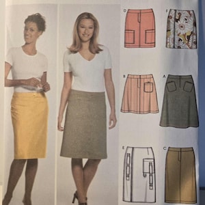 May include: Simplicity sewing pattern number 5066, easy-to-sew, for sizes HH 6, 8, 10, 12. The pattern includes instructions for making six different skirts: a yellow skirt, a brown skirt, a pink striped skirt, a green skirt, a white skirt with pockets, and a brown skirt with pockets.