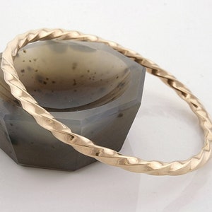 Chunky twisted sleek brass bangle bracelet 2.91 image 1