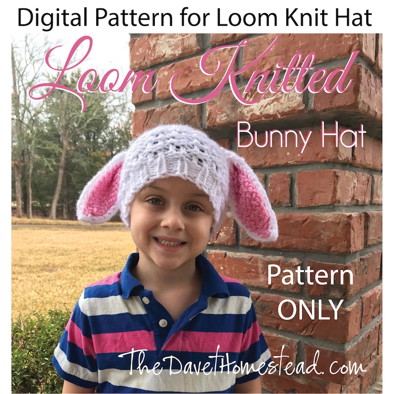 May include: A white and pink knitted bunny hat with floppy ears. The hat is being worn by a child. The image includes the text "Loom Knitted Bunny Hat" and "Pattern ONLY".